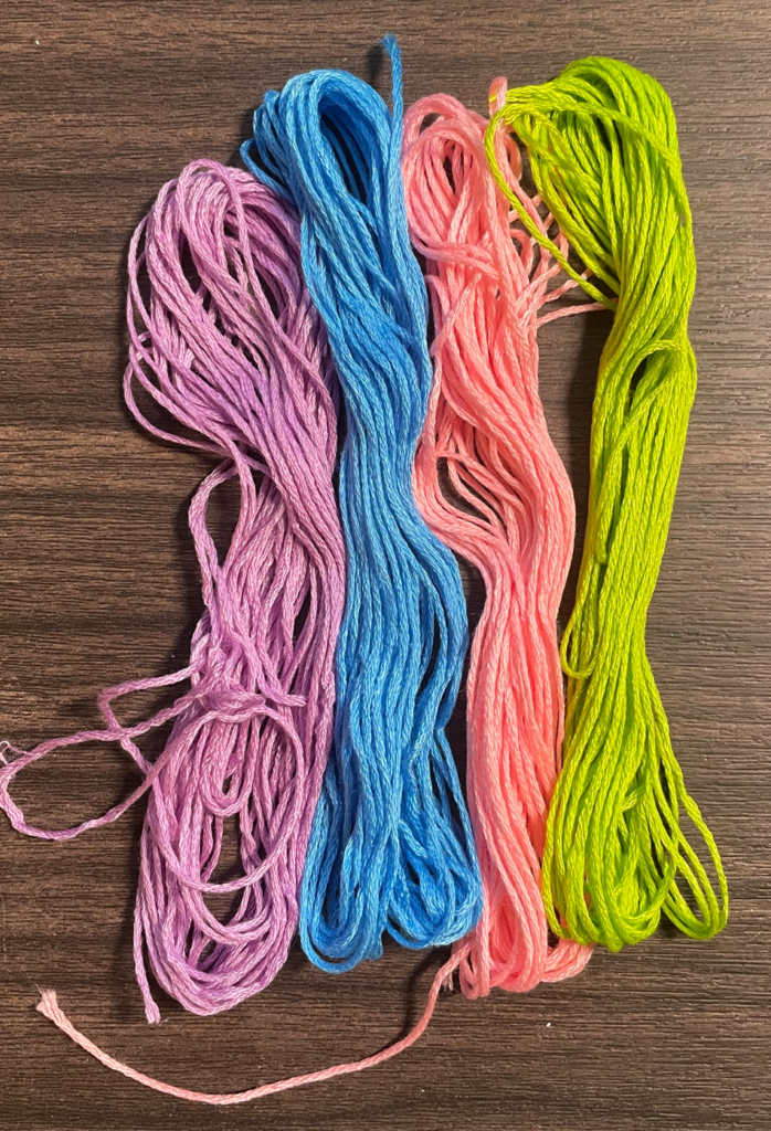 This is a photo of embroidery string, specifically the type and colors we'll be using.